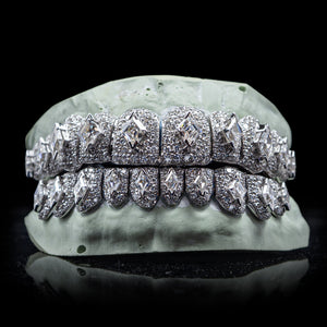 Iced VVS Moissanite with Lozenge Cut Center Stone Grillz