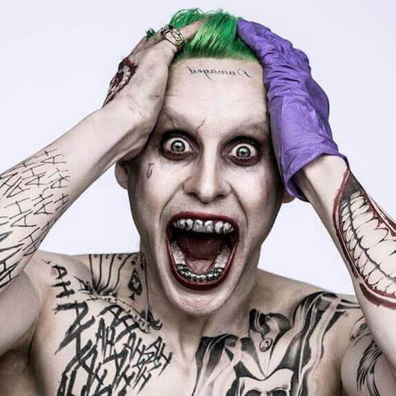 Solid Sterling Silver Teeth Joker Custom-Made Grillz shown on Joker