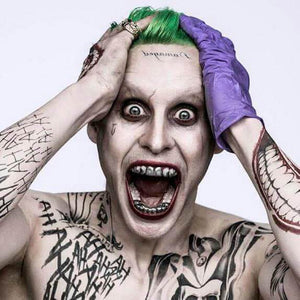 Solid Sterling Silver Teeth Joker Custom-Made Grillz shown on Joker