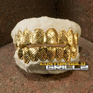 Solid Gold Diamond Cut Custom-Made Grillz including Logo on Creative Background