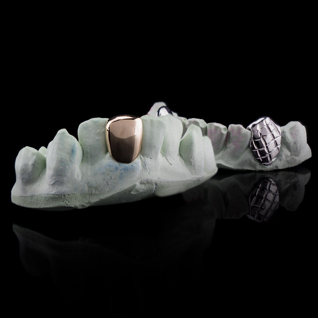 Solid Gold Single Bottom Custom-Made Tooth Grillz with Silver Diamond Cut Single Grill